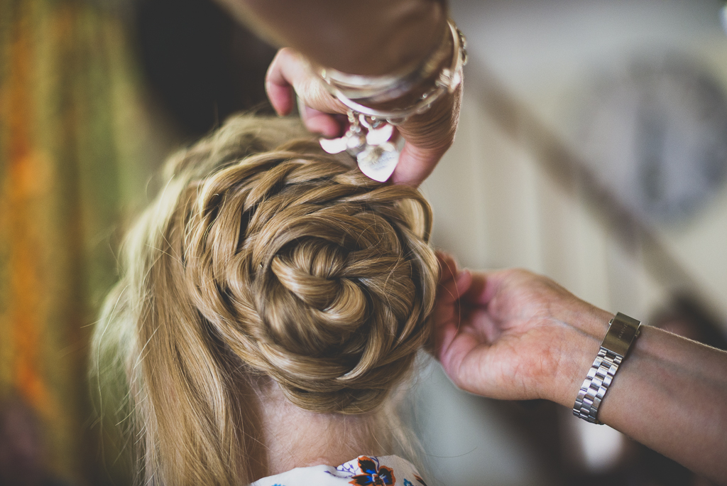 Wedding Photography French château - bride's hair being done - Wedding Photographer