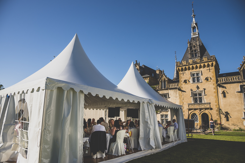 Wedding Photography French château - dinner under marquee - Wedding Photographer
