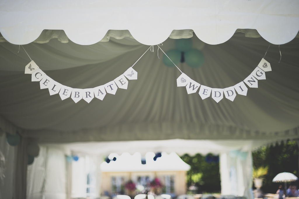Wedding Photography French château - paper garland on marquee - Wedding Photographer