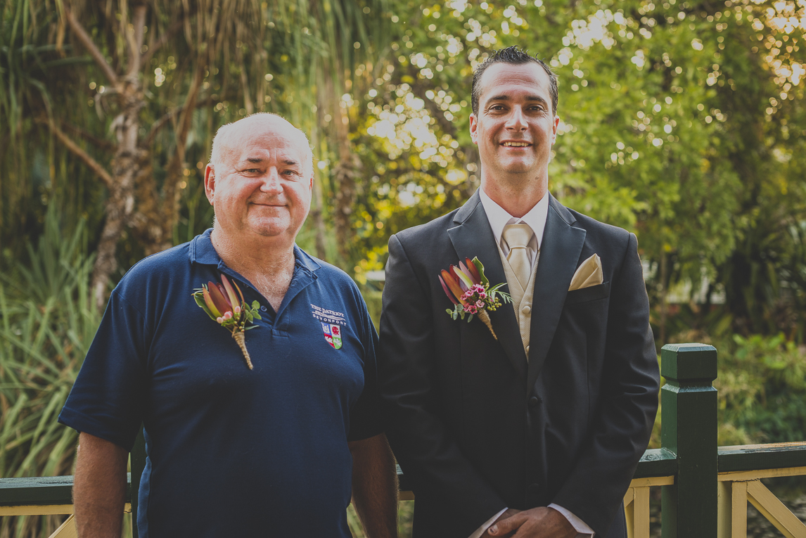 rozimages - wedding photography - groom and dad in law posing and smiling - Broome, Australia