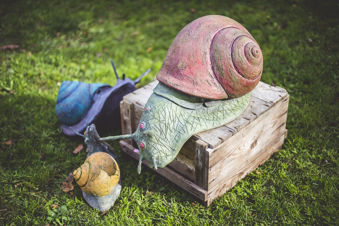 rozimages - event photography - Expo Vente de Végétaux Rares 2015 - sculpture of three snails - St Elix le Chateau, France