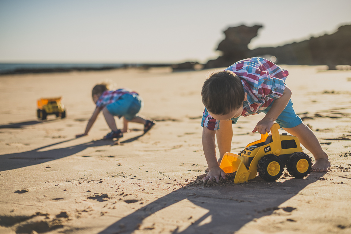 rozimages - family photography - beach session - two boys playing with toy trucks on beach - Reddell Beach, Broome, Australia