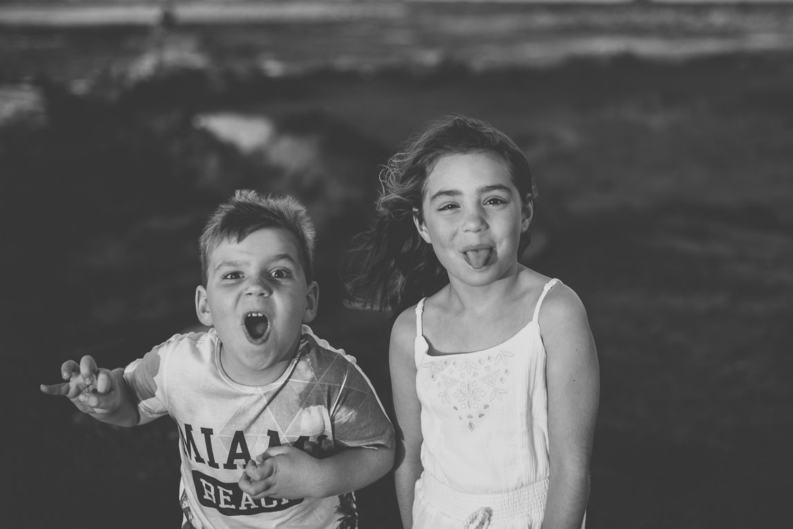 Family photo session - two children making funny faces - Family Photographer
