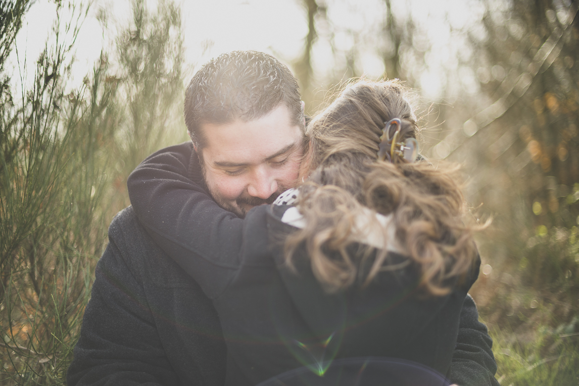 Couple session in the countryside - man and woman laugh hug - Couple Photographer