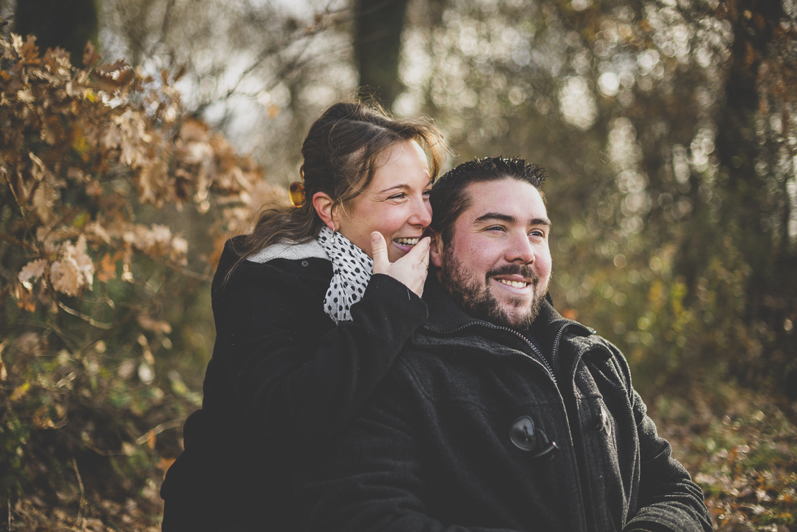 Couple session in the countryside - man and woman laugh - Couple Photographer