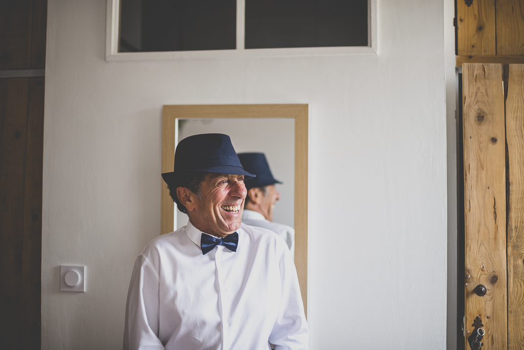 Wedding Photography Toulouse - hatted man smiles - Wedding Photographer