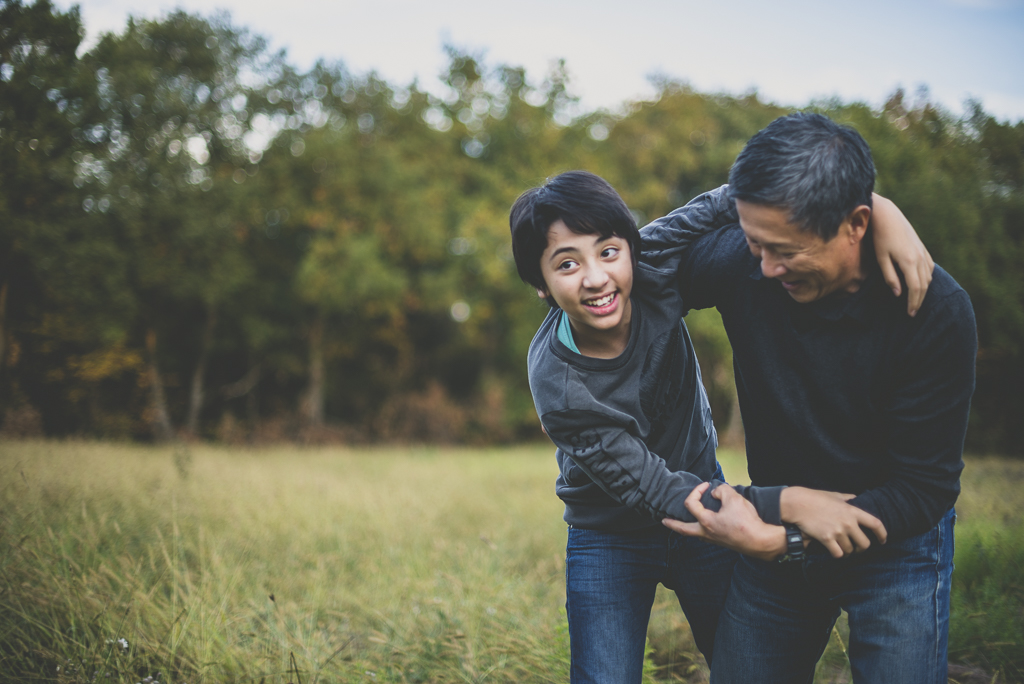 Outdoor family session - boy playing with his dad - Family Photographer